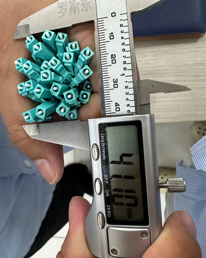 24 LC simplex fiber connectors measured at 41 mm with a caliper